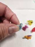 tiny dinosaur putty pets